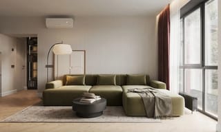 Side-by-side comparison of an air quality monitor and an air purifier in a living room