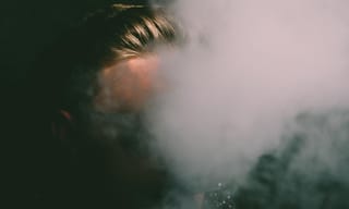 White vapor cloud rising against a dark background - Photo by Luemen Rutkowski on Pexels