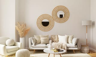 Bright modern living room with neutral furniture, the kind of space where a premium or budget air purifier would fit