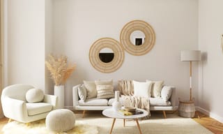 Bright, airy living room with open floor space showing ideal air purifier placement area