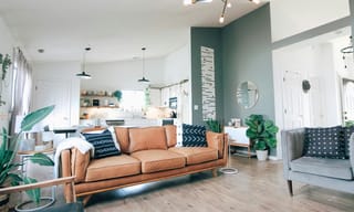 A bright living room with clean air and natural light filtering through windows