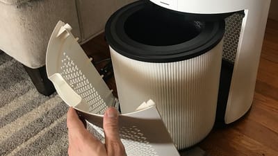 Levoit air purifier with HEPA filter exposed showing internal filtration components