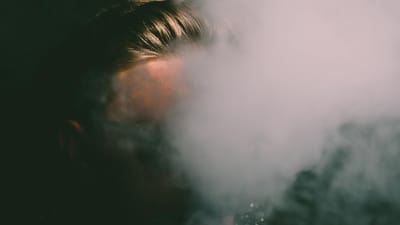 White vapor cloud rising against a dark background - Photo by Luemen Rutkowski on Pexels