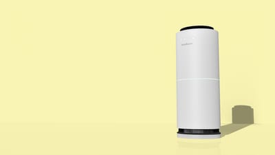 Small compact desktop air purifier on a table
