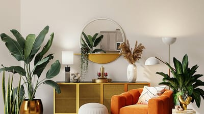 A bright, modern living room with houseplants and natural light, representing clean indoor air