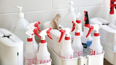 Household cleaning products and spray bottles, common sources of volatile organic compounds in homes