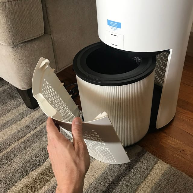 Levoit air purifier with HEPA filter exposed showing internal filtration components