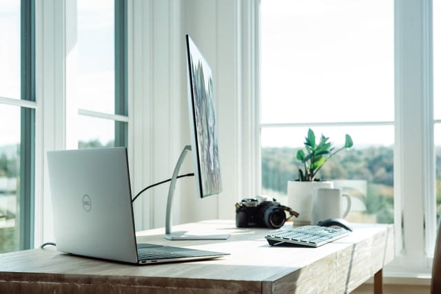Clean bright desk workspace with natural light, ideal setting for a portable air purifier