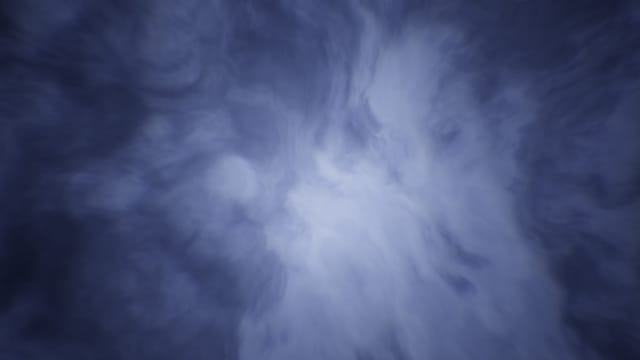 Wisps of smoke swirling in dark blue light - Photo by Logan Voss on Unsplash